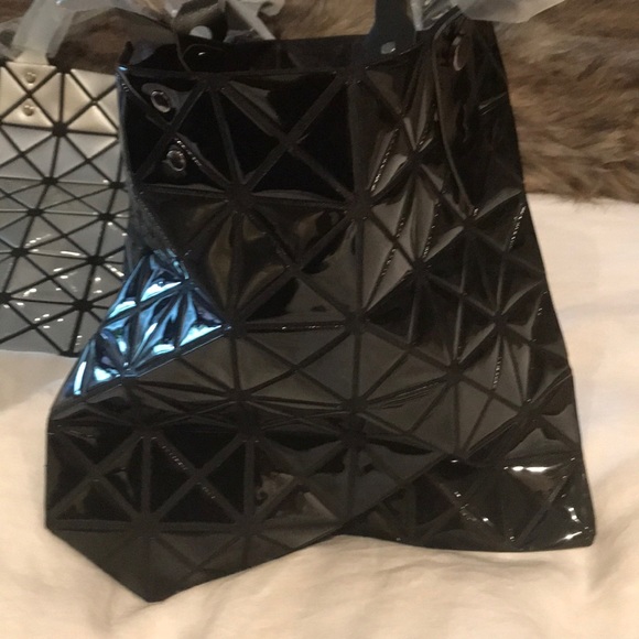 Two handbags with zip closure at top. - Picture 3 of 5